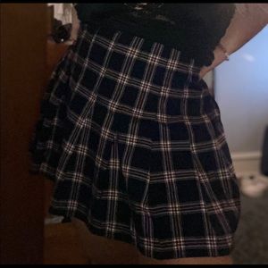 size 10, fits smaller and can be rolled up. school girl vibes skirt.